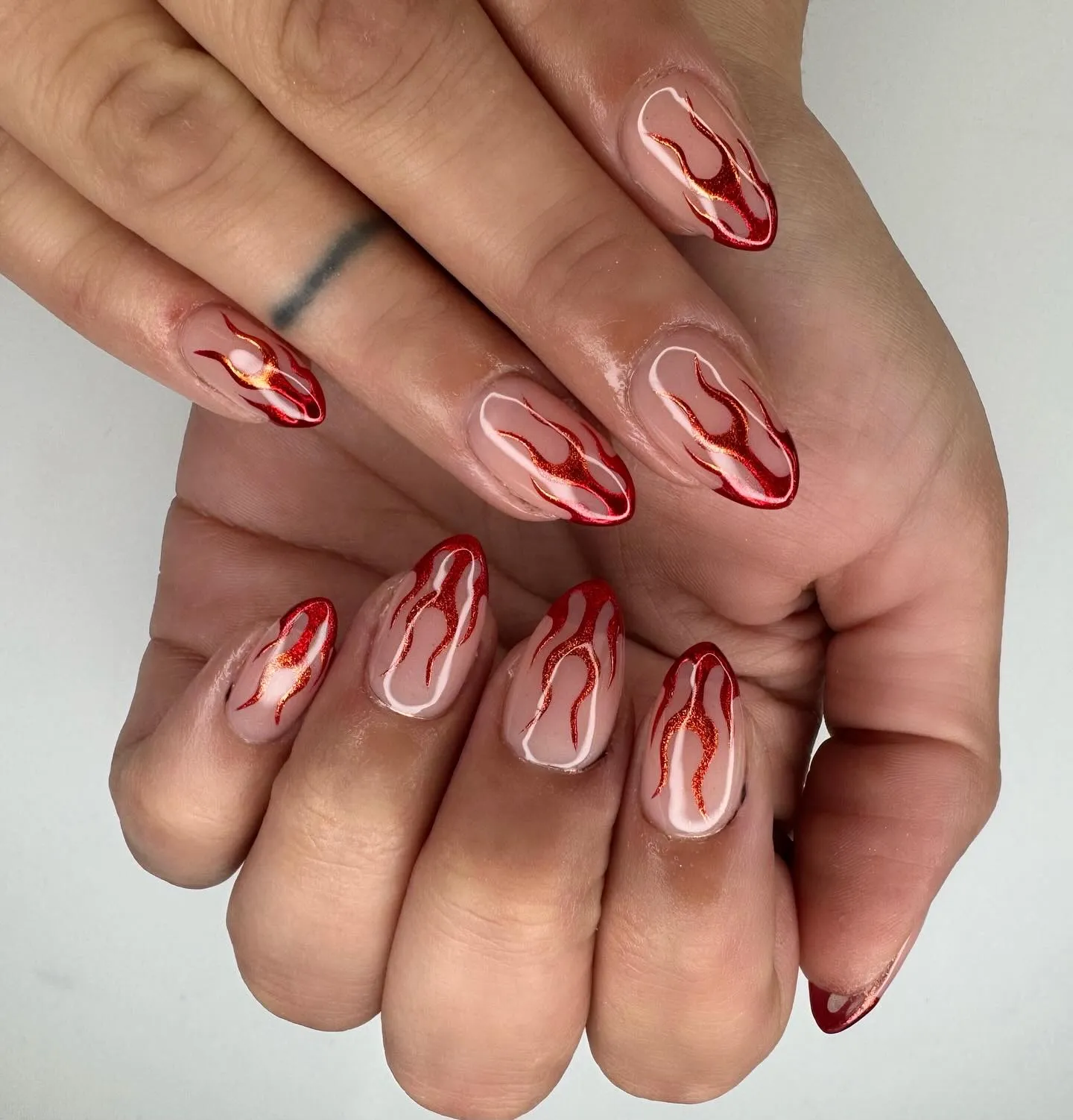 And rounding things off,  @allyssapower created the ultimate red-and-orange ombré flames that look like they’re in motion. A bold choice for anyone who loves a slay-nails moment.