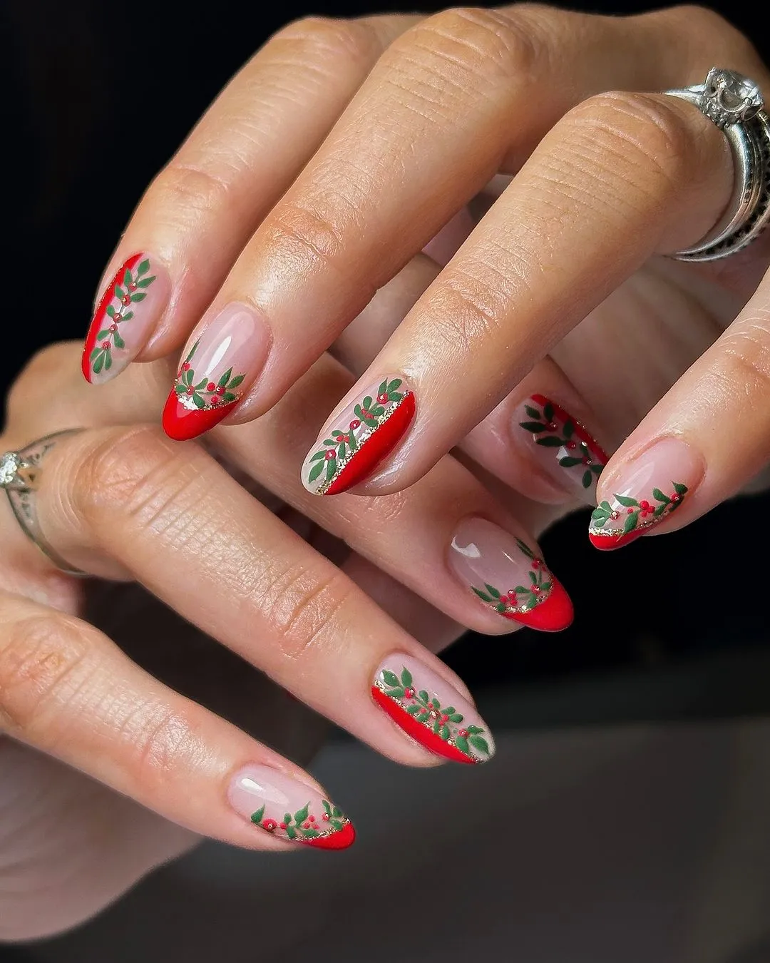 If you’re after something timeless, the red French tips shared by @scratchmagazine with holly leaves and berry accents deliver total Classy Christmas Nails energy. The crisp red edges make them festive, but the subtle greenery keeps them chic enough for any occasion.