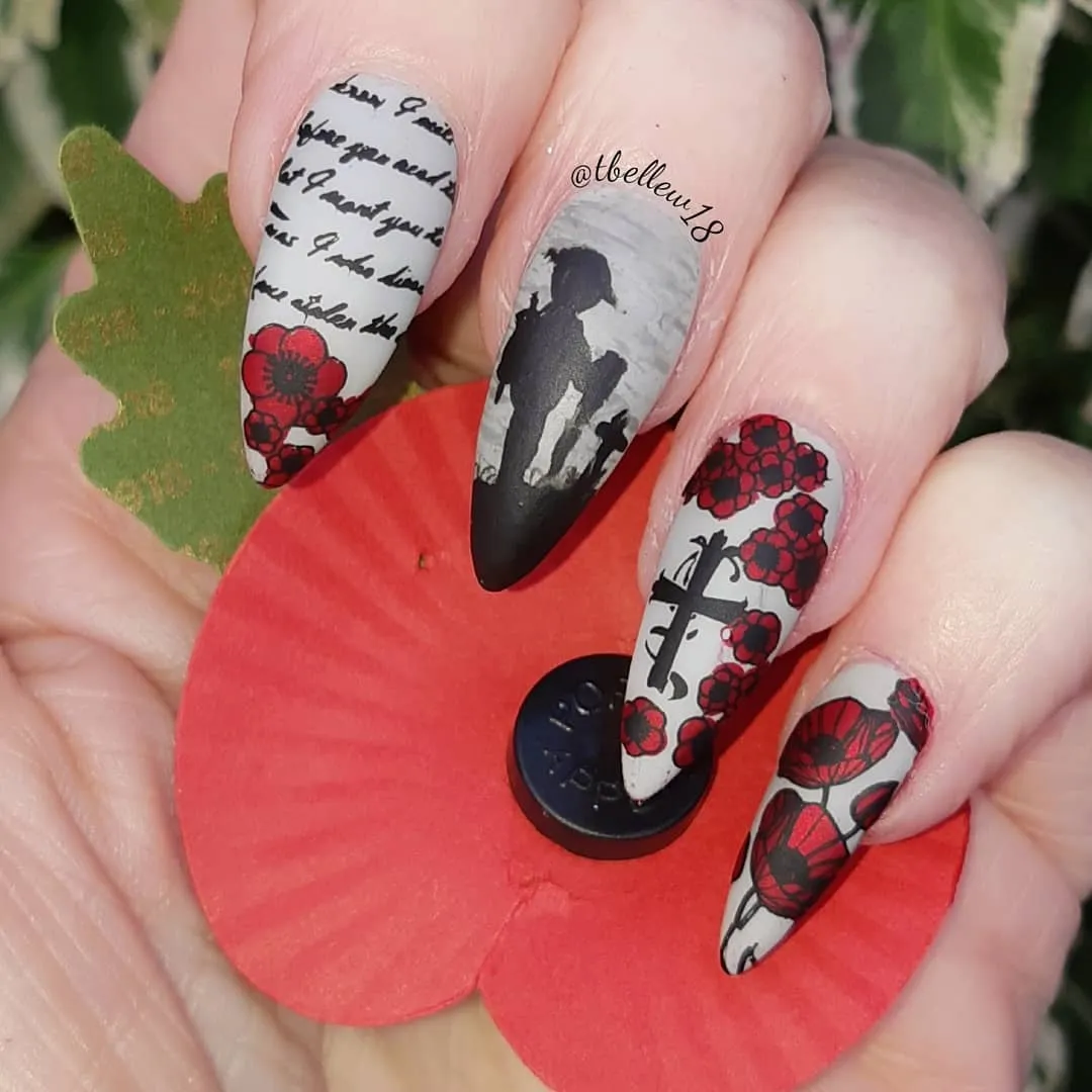 This intricate poppy nail art by @tbellew18 captures the emotion of November 11 with silhouettes, handwritten script, and clusters of delicate poppies. A thoughtful design that feels both artistic and heartfelt — ideal for Memorial Day or a tribute manicure.